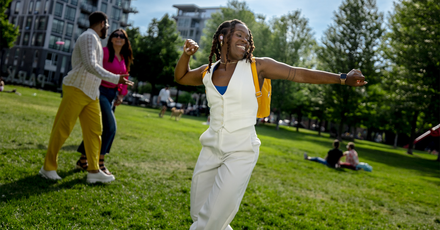 woman dancing in gold medal park_1500x785